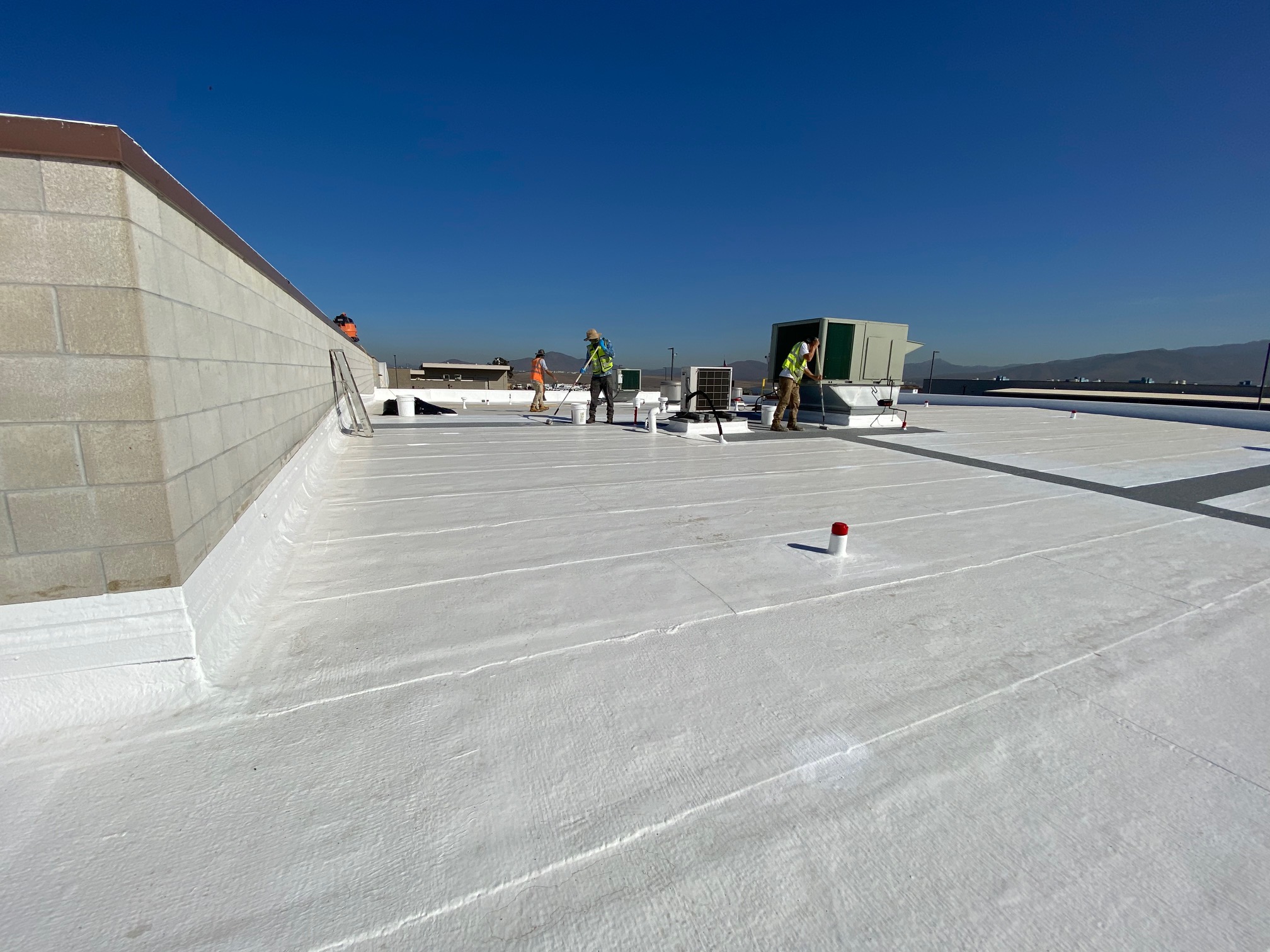 Silicone Roof Coating Systems in Birmingham - Fluid-Applied Recover & Warranty in Birmingham